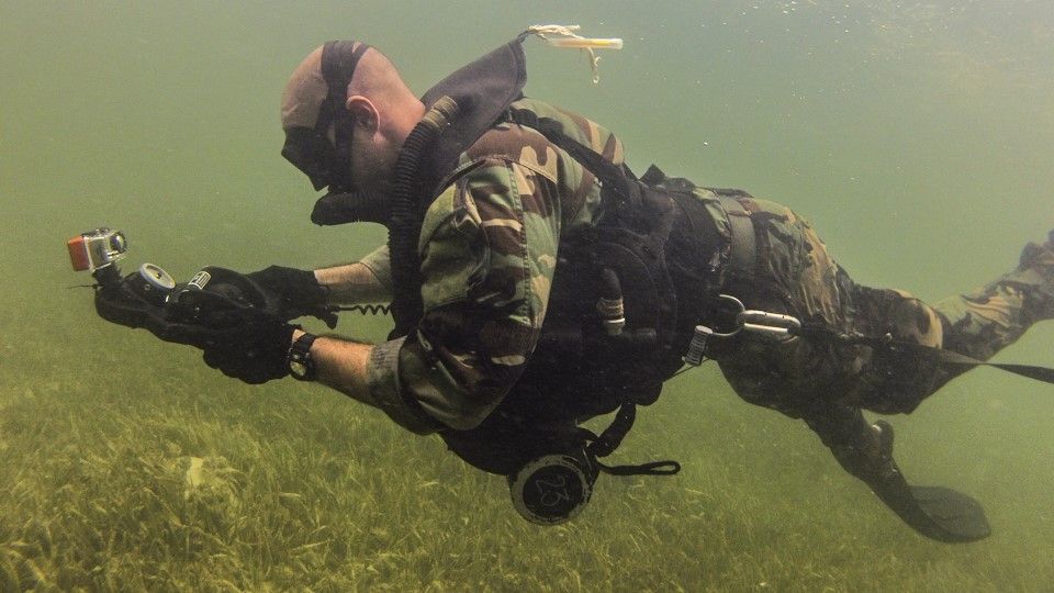 Green Beret doing Underwater Navigation